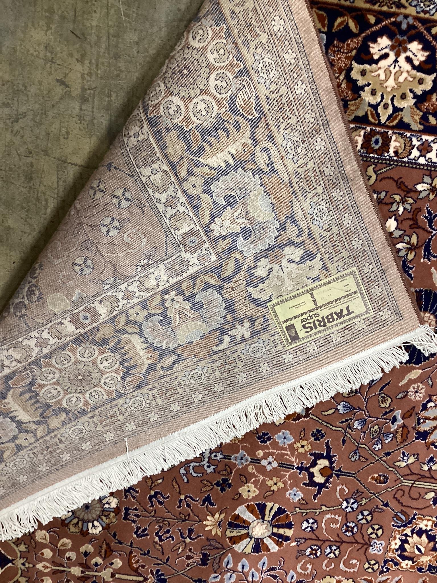 A modern Tabriz style peach ground carpet, approx. 400 x 300cm